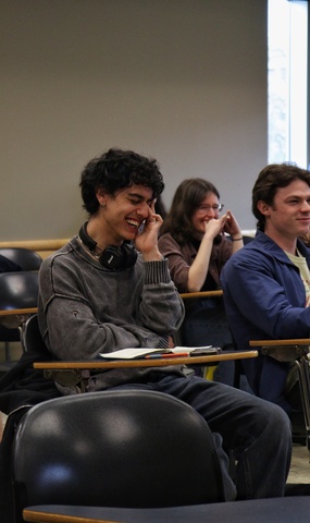 Student laughing at Brooks Wheelan's comment