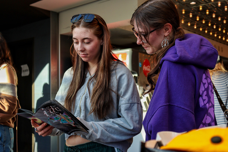 Two students stand together at the Iowa City Documentary Film Festival.