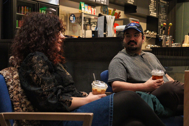 Two people sitting and speaking with each other at the Iowa City Documentary Film Festival.