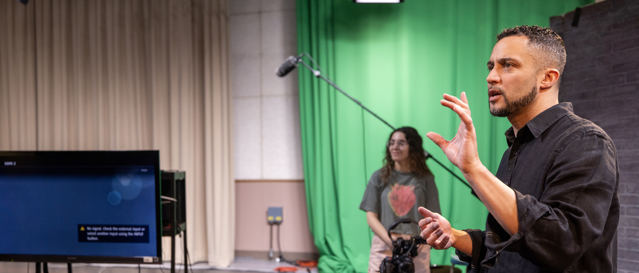 faculty teaching in studio with students